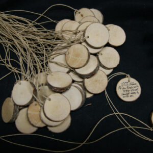 Small birch medallions with hemp cord.